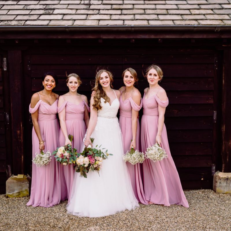 Bride and bridesmaids with flowers